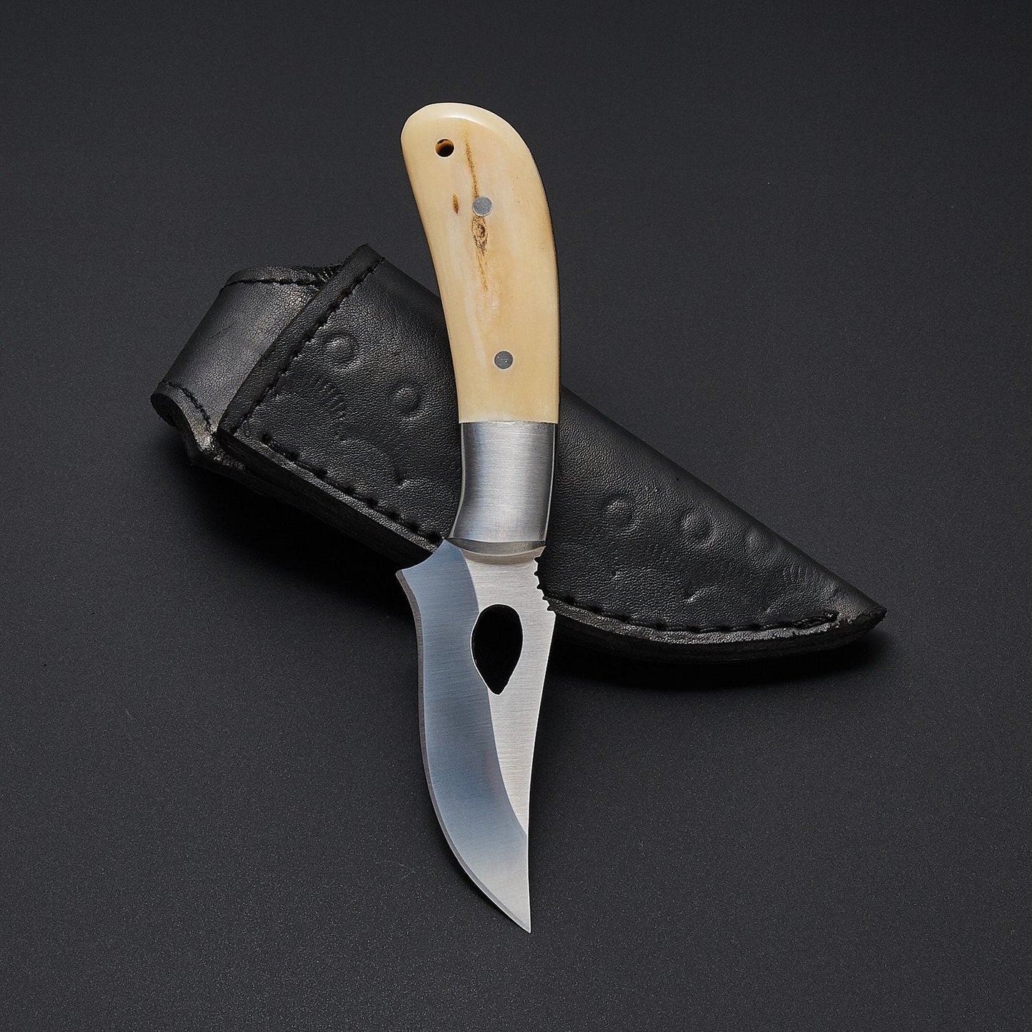 The Fieldmaster's Companion: 7.5-Inch Skinning Hunting Knife with Full Tang D2 Steel Blade, Bone Handle, and Steel Bolster