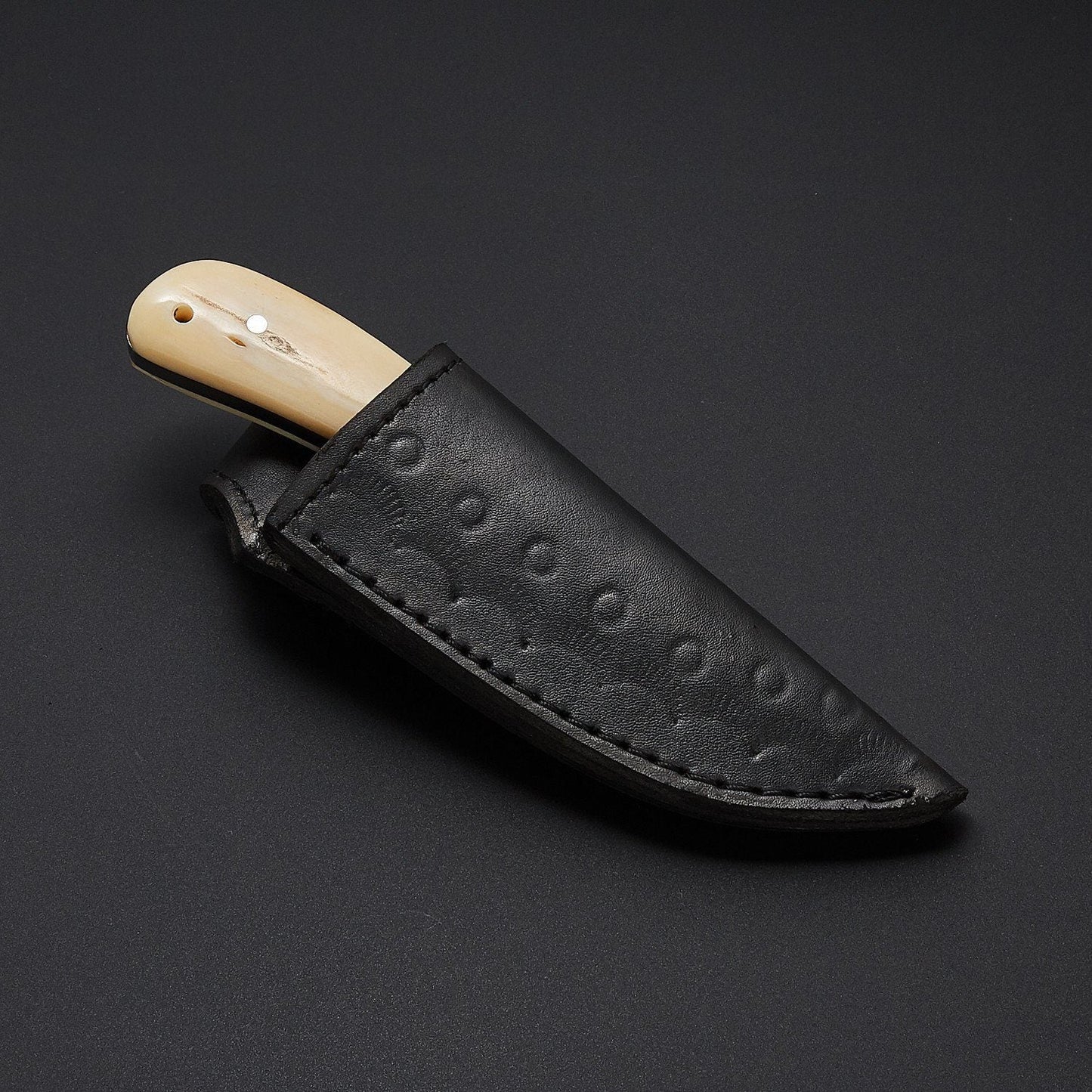 The Fieldmaster's Companion: 7.5-Inch Skinning Hunting Knife with Full Tang D2 Steel Blade, Bone Handle, and Steel Bolster
