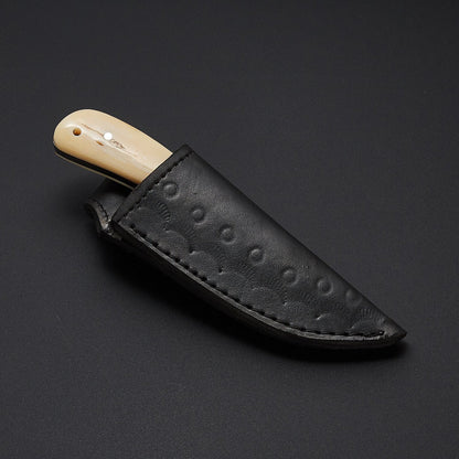 The Fieldmaster's Companion: 7.5-Inch Skinning Hunting Knife with Full Tang D2 Steel Blade, Bone Handle, and Steel Bolster