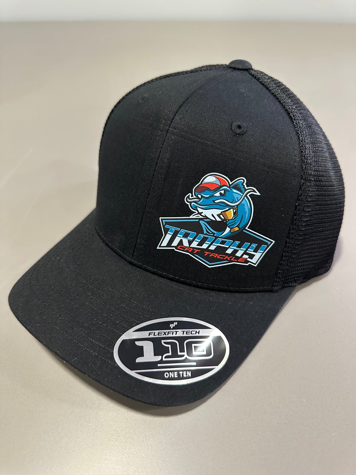 Trophy Cat Tackle Black/Black FlexFit 110 Snap Back Trucker Hat