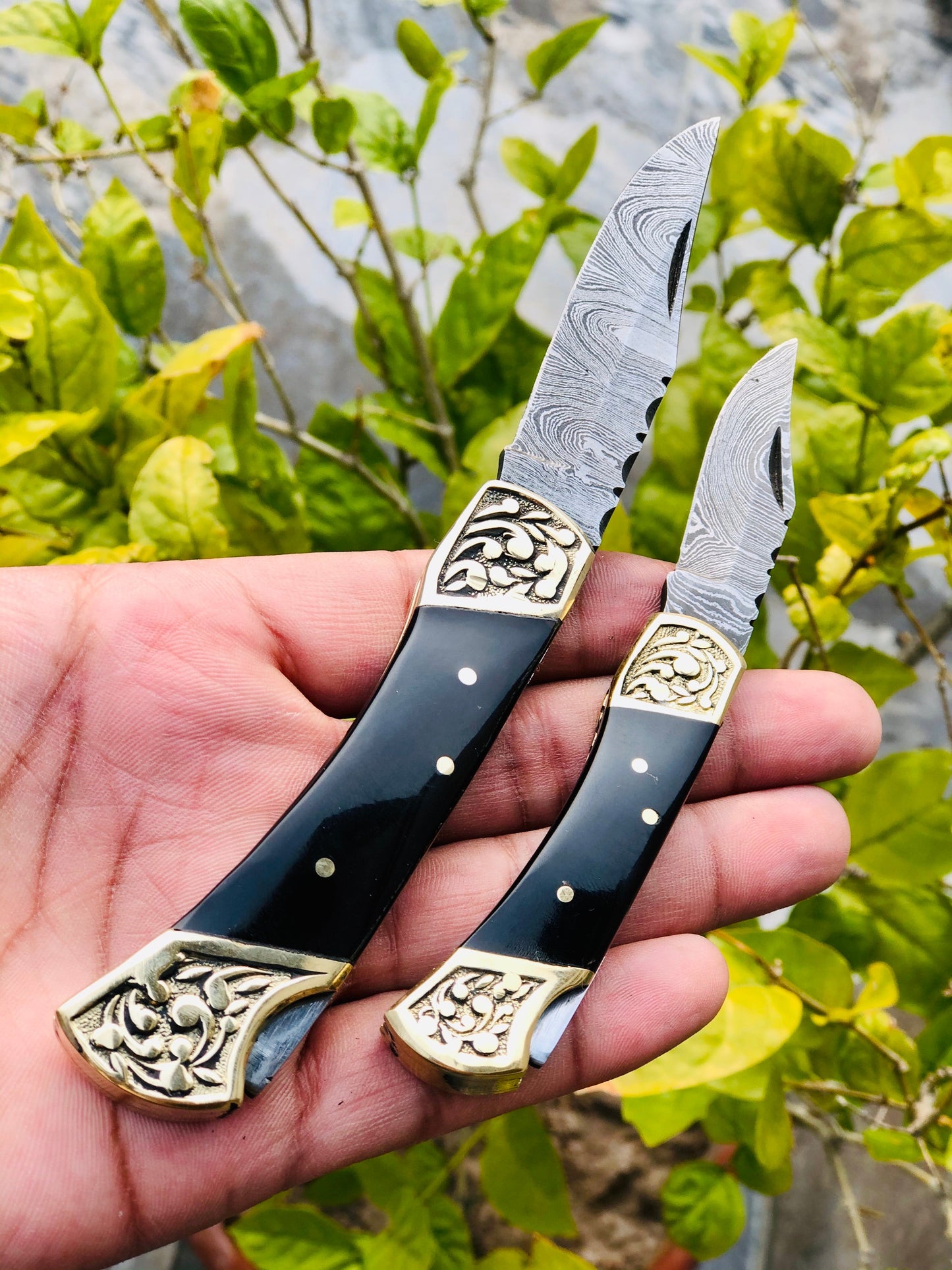 Pair of Custom Handmade Damascus Steel Folding Pocket Knives with Buffalo Horn and Engraved Brass Bolsters Handle
