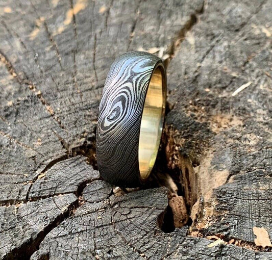 Custom Damascus Steel Anniversary Ring with Brass Inlay